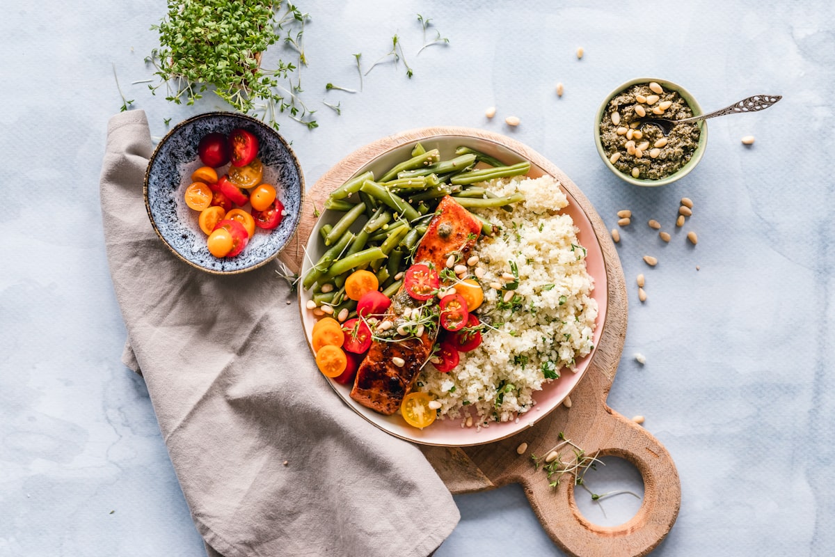 Mediterranean quinoa bowl with fresh vegetables and herbs